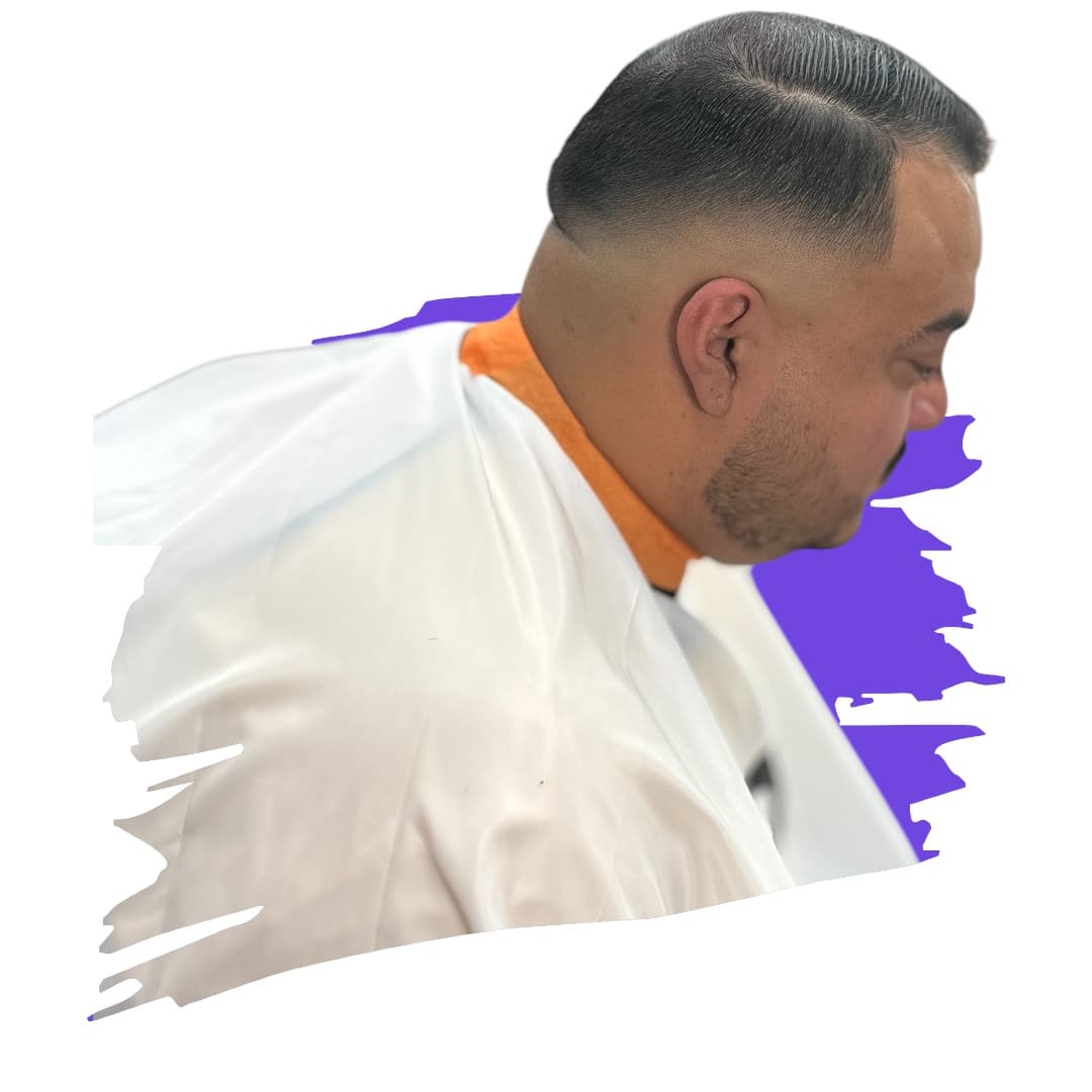 Classic side part with a low taper and comb-through finish